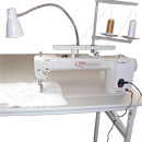 Queen Quilter 18 Machine with Sit Down Table QQSD. Check Out The Handi Quilter Sweet Sixteen Below!