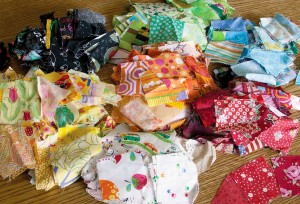 Scraps, pieces and extras. These spare parts will make a lovely quilt someday!