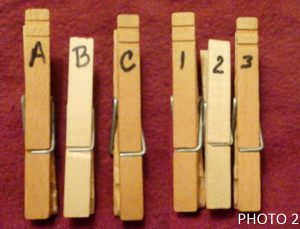 First, use a marker or pen to label the clothespins based on the labels found on the pattern pieces or the pattern guide.