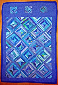 Here is an easy scrap quilt idea that is great fun to make.