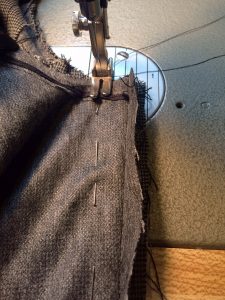 Sewing jacket with side seam.