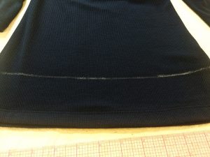 New hem line marked with wax.