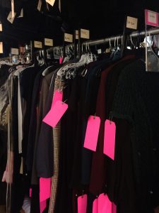 Most film and television costume departments in New York City use bright pink oak tags to identify a garment as needing an alteration.