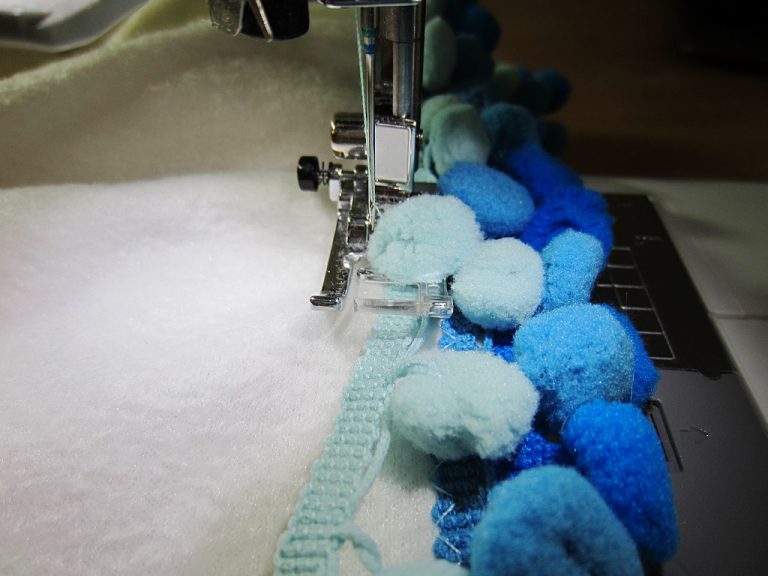 DIY Pom Pom Fleece Blanket Blog