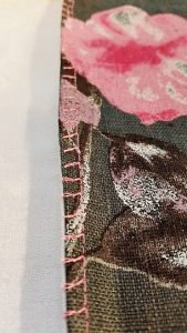 The left side is machine stitched with an Overcast stitch. The right side is hand stitched. Both have no raw edges showing on either side.