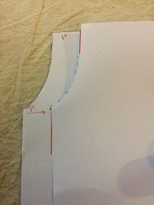 Folding one side over to use as guide for redrawing the arms eye seam.