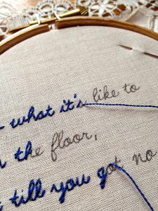 I love the cross-stitching lyrics one!