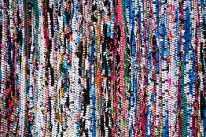 Take scraps and make a woven rag rug with a wonderful and colorful texture!