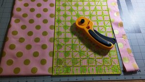 Cut your fabric into a square and then fold into quarters.