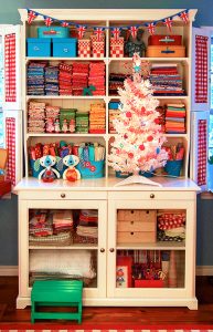 This hutch makes a wonderful storage area for fabric, and other than price & space, I wouldn’t hesitate to have one of these in my home.