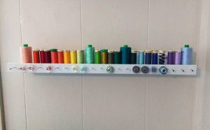 I keep my standard, quilting cotton weight threads organized by ROYGBIV (red, orange, yellow, green, blue, indigo, violet).