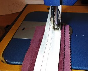 I like to sew the zipper plaques first.