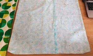 Now place your two backing pieces on top of the front panel, right sides together.