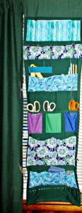 My sewing room curtain organizer panels use all of the above kinds of pockets.