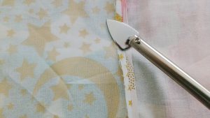 For fans of mini-quilts, or anyone who wants to iron their seams open, the mini-iron makes short work of it.
