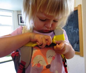 If your child is really little, they may not be able to manage the clasp on their own.