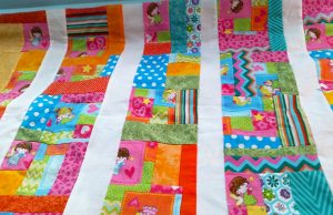 “Improvise” a cheerful quilt or smaller project & smell the beauty of your creation this spring.