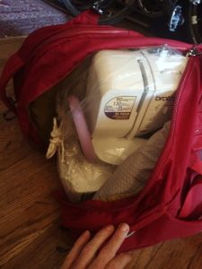 I discovered that my favorite freakishly lightweight Brother sewing machine fit perfectly into the backpack.