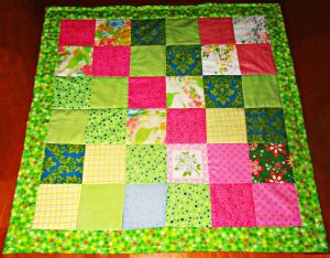 Baylee quilt, caption, I made this quick scrap quilt in only about an hour & a half.