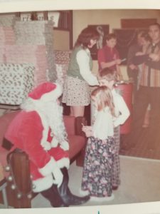 Mom made long skirt and plaid pants for Santa visit. My brother and I were very stylish.